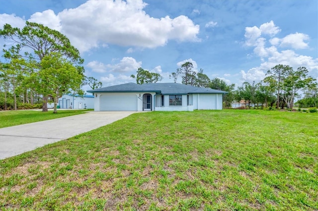 5412 Ulysses St, Port Charlotte, FL 33981 - single story home with an attached garage, driveway, and a front yard