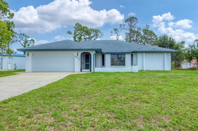 5412 Ulysses St, Port Charlotte, FL 33981 - ranch-style house with stucco siding, a garage, driveway, a front yard, and roof with shingles