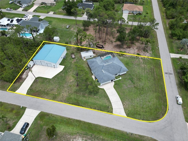 5412 Ulysses St, Port Charlotte, FL 33981 - aerial view of residential area with property parcel outlined and a pool