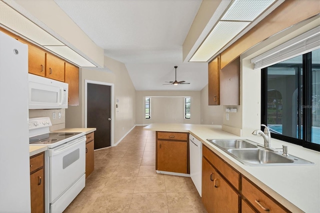 5412 Ulysses St, Port Charlotte, FL 33981 - kitchen with white appliances, a sink, light countertops, ceiling fan, and light tile patterned flooring