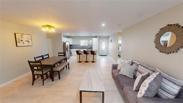 608 Saint Judes Dr, Longboat Key, FL 34228 - living area featuring baseboards and recessed lighting