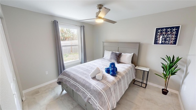 608 Saint Judes Dr, Longboat Key, FL 34228 - bedroom with baseboards and a ceiling fan