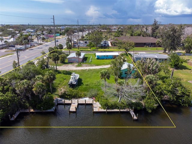 1999 Placida Rd, Englewood, FL 34223 - aerial perspective of suburban area with property parcel outlined and a nearby body of water