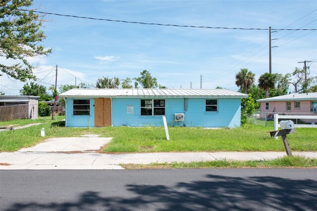 1999 Placida Rd, Englewood, FL 34223 - view of front of home featuring a metal roof