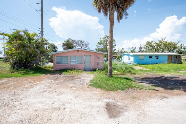 1999 Placida Rd, Englewood, FL 34223 - view of front of property featuring dirt driveway