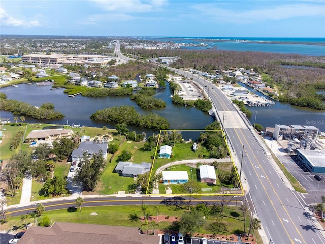 1999 Placida Rd, Englewood, FL 34223 - aerial view of residential area with a large body of water and property boundaries highlighted
