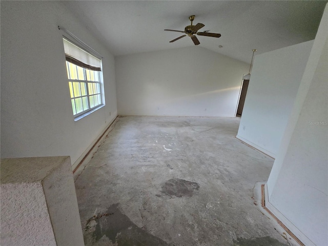 4900 Hurley Ave, North Port, FL 34288 - unfurnished living room featuring concrete floors, lofted ceiling, and a ceiling fan