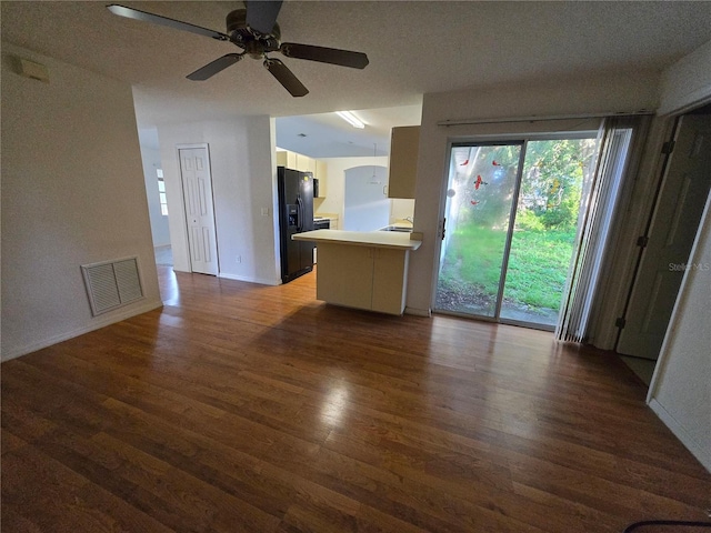 4900 Hurley Ave, North Port, FL 34288 - unfurnished living room featuring ceiling fan and wood finished floors