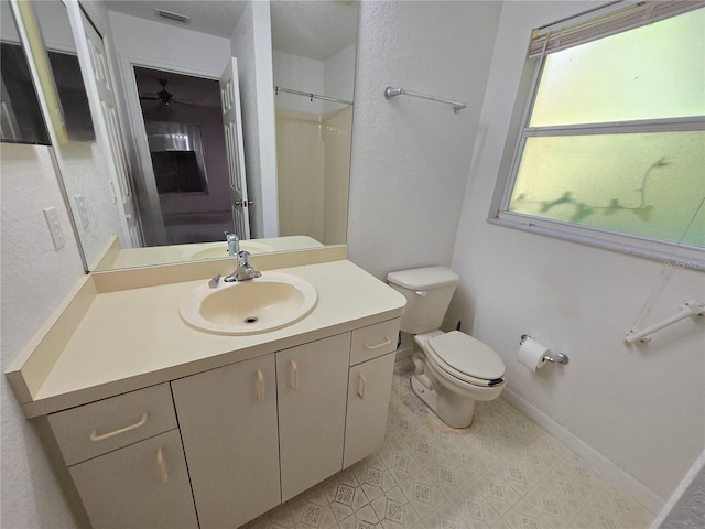 4900 Hurley Ave, North Port, FL 34288 - full bathroom with vanity, a shower, and ceiling fan