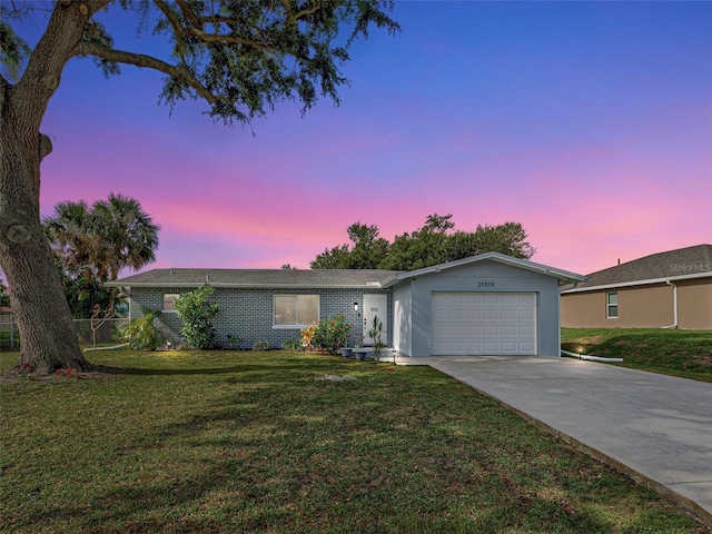 21519 Fairway Ave, Port Charlotte, FL 33952 - ranch-style house featuring a garage and concrete driveway
