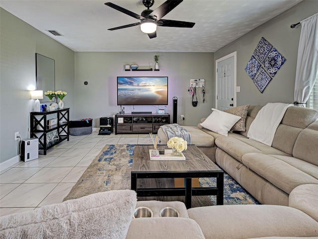 21519 Fairway Ave, Port Charlotte, FL 33952 - living room with a ceiling fan and baseboards