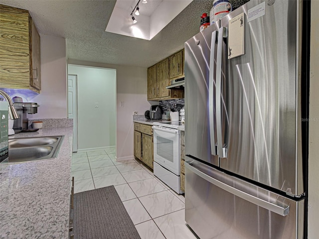 21519 Fairway Ave, Port Charlotte, FL 33952 - kitchen featuring freestanding refrigerator, electric stove, a textured ceiling, light marble finish flooring, and a sink