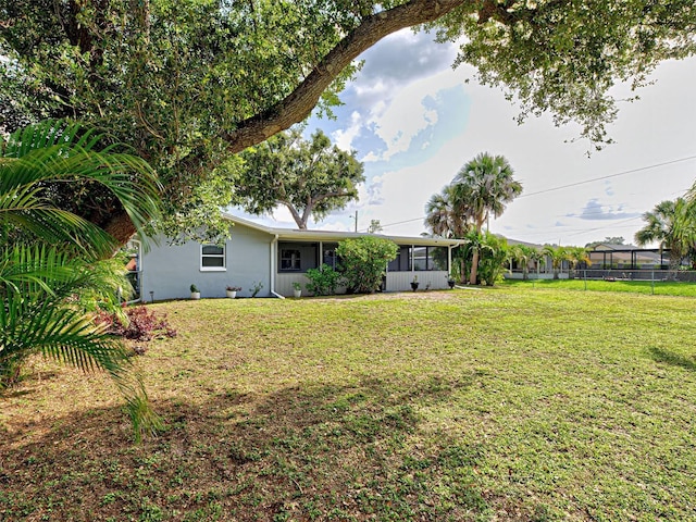 21519 Fairway Ave, Port Charlotte, FL 33952 - view of yard with a sunroom