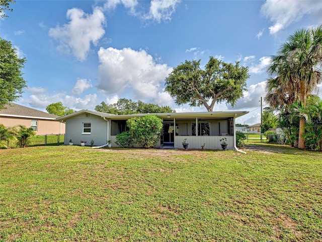 21519 Fairway Ave, Port Charlotte, FL 33952 - back of property with a sunroom