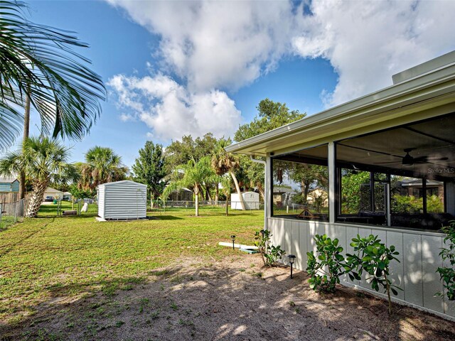 21519 Fairway Ave, Port Charlotte, FL 33952 - view of yard featuring ceiling fan and a sunroom