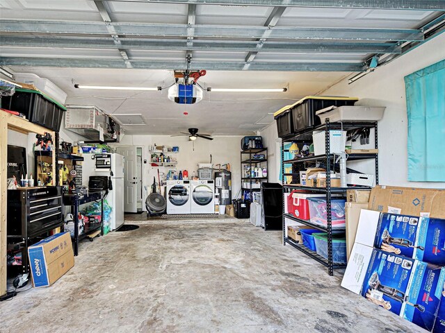 21519 Fairway Ave, Port Charlotte, FL 33952 - garage with washing machine and dryer, a garage door opener, and electric water heater
