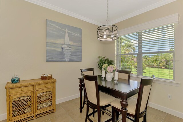 13051 Creekside Ln, Port Charlotte, FL 33953 - dining area with crown molding and light tile patterned flooring