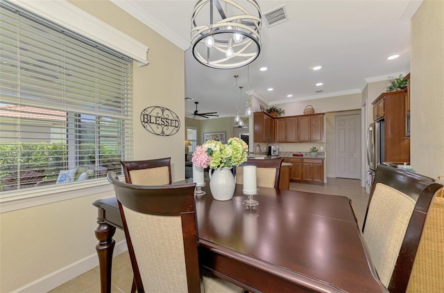 13051 Creekside Ln, Port Charlotte, FL 33953 - dining room with light tile patterned flooring, crown molding, a ceiling fan, and recessed lighting