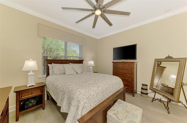 13051 Creekside Ln, Port Charlotte, FL 33953 - bedroom featuring crown molding, light wood-style flooring, and a ceiling fan