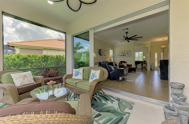 13051 Creekside Ln, Port Charlotte, FL 33953 - sunroom with a ceiling fan and an outdoor living space