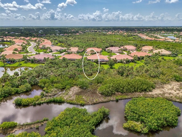 13051 Creekside Ln, Port Charlotte, FL 33953 - aerial perspective of suburban area with a large body of water