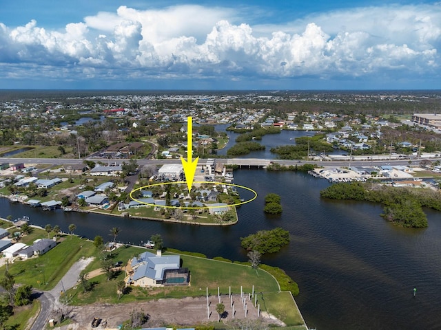 1765 Manor Rd, Englewood, FL 34223 - aerial perspective of suburban area with a nearby body of water