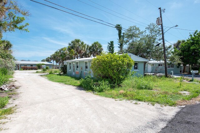 1765 Manor Rd, Englewood, FL 34223 - view of dirt / gravel road