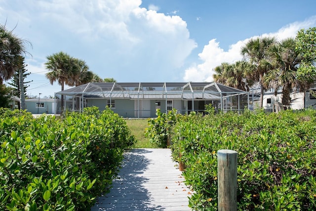 1765 Manor Rd, Englewood, FL 34223 - back of house with a lanai