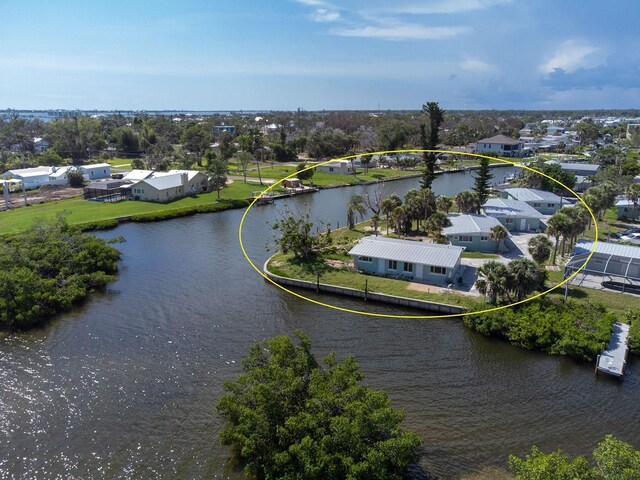 1790 Manor Rd, Englewood, FL 34223 - aerial perspective of suburban area with a nearby body of water