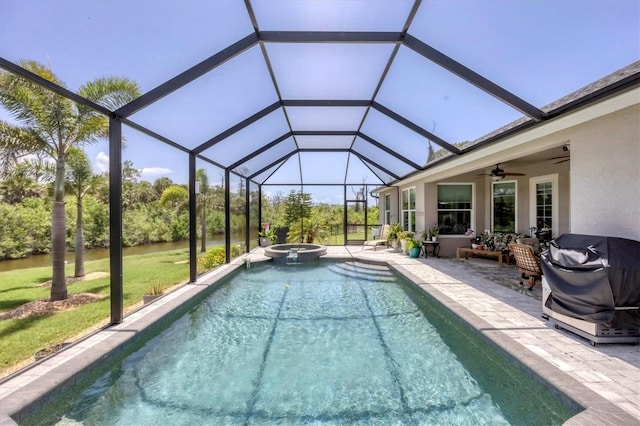 124 Cutlass Dr, Rotonda West, FL 33947 - view of swimming pool with a ceiling fan, a patio area, grilling area, a pool with connected hot tub, and glass enclosure