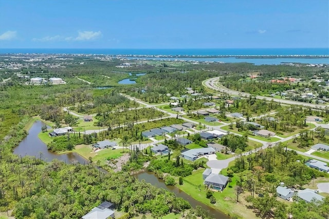 124 Cutlass Dr, Rotonda West, FL 33947 - view of property location featuring a large body of water and nearby suburban area