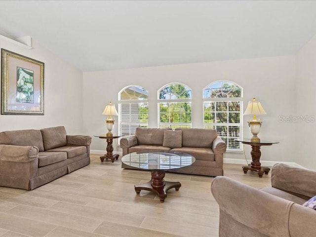 23 Pine Valley Ct, Rotonda West, FL 33947 - living room featuring light wood-type flooring