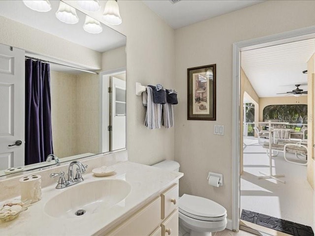 23 Pine Valley Ct, Rotonda West, FL 33947 - full bathroom with vanity, curtained shower, and ceiling fan