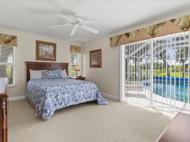 23 Pine Valley Ct, Rotonda West, FL 33947 - bedroom featuring access to outside, carpet flooring, and a ceiling fan