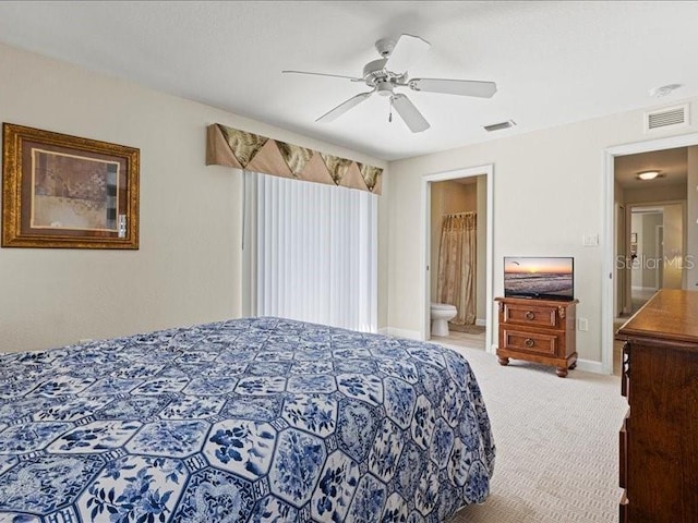 23 Pine Valley Ct, Rotonda West, FL 33947 - bedroom featuring carpet flooring, a ceiling fan, and ensuite bathroom
