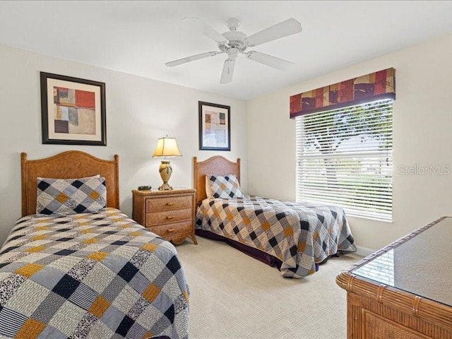 23 Pine Valley Ct, Rotonda West, FL 33947 - bedroom featuring light carpet and ceiling fan