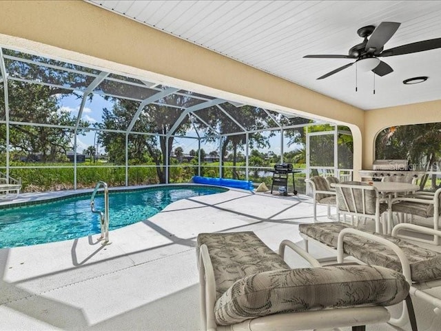 23 Pine Valley Ct, Rotonda West, FL 33947 - outdoor pool featuring a patio area, a grill, a ceiling fan, and a lanai