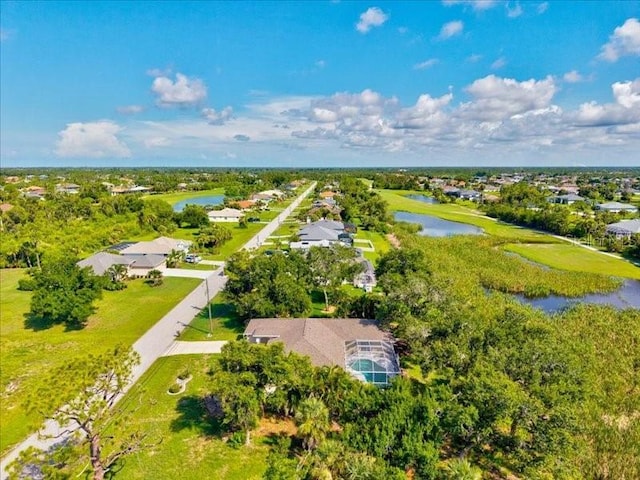 23 Pine Valley Ct, Rotonda West, FL 33947 - aerial view of residential area with a large body of water