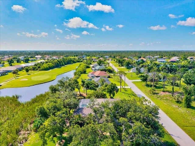 23 Pine Valley Ct, Rotonda West, FL 33947 - aerial view of residential area with a nearby body of water and a local golf course