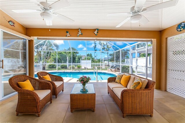 127 Jennifer Dr, Rotonda West, FL 33947 - outdoor pool featuring ceiling fan, outdoor lounge area, a lanai, and a patio area
