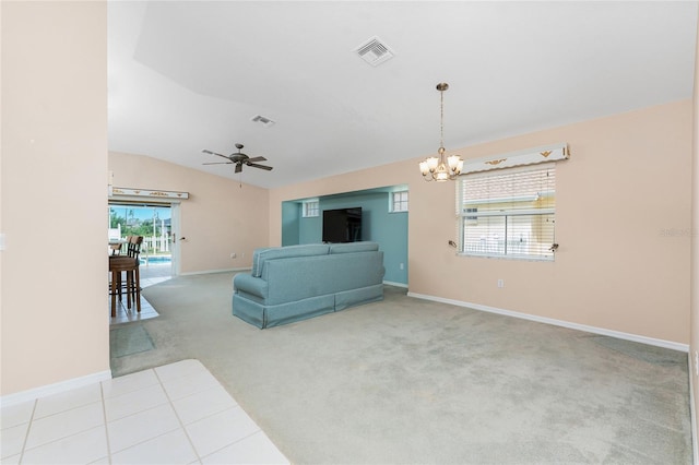 127 Jennifer Dr, Rotonda West, FL 33947 - unfurnished living room with a chandelier, carpet, lofted ceiling, and a ceiling fan