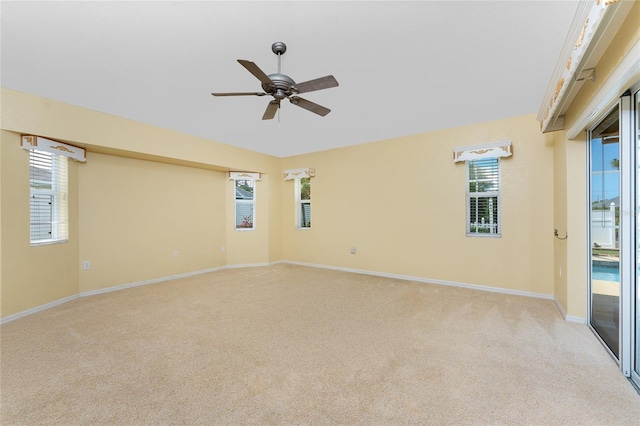 127 Jennifer Dr, Rotonda West, FL 33947 - unfurnished room featuring light carpet, ceiling fan, and healthy amount of natural light