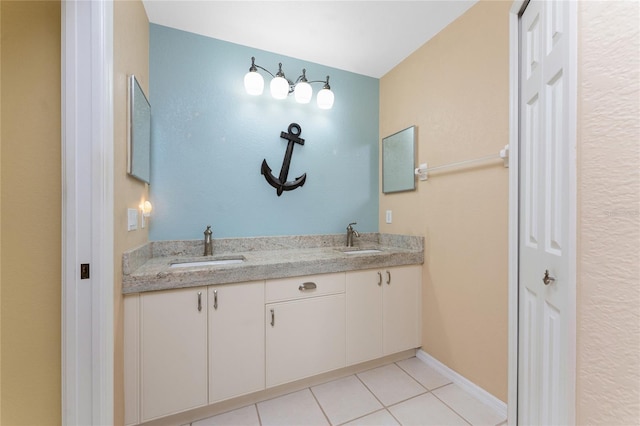 127 Jennifer Dr, Rotonda West, FL 33947 - full bathroom with double vanity and tile patterned flooring
