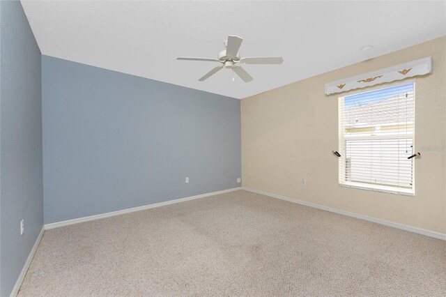 127 Jennifer Dr, Rotonda West, FL 33947 - carpeted spare room with baseboards and a ceiling fan