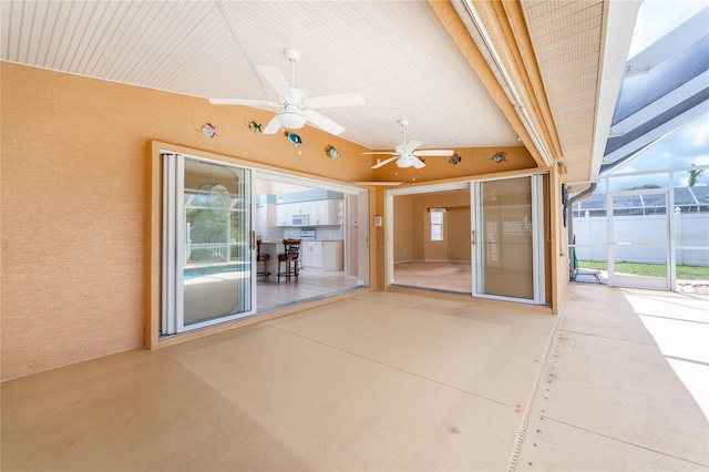 127 Jennifer Dr, Rotonda West, FL 33947 - view of patio with a ceiling fan and a lanai