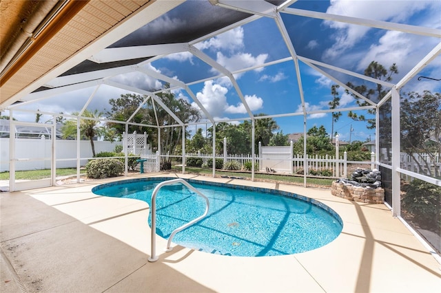 127 Jennifer Dr, Rotonda West, FL 33947 - view of pool featuring a fenced backyard, a patio area, and glass enclosure