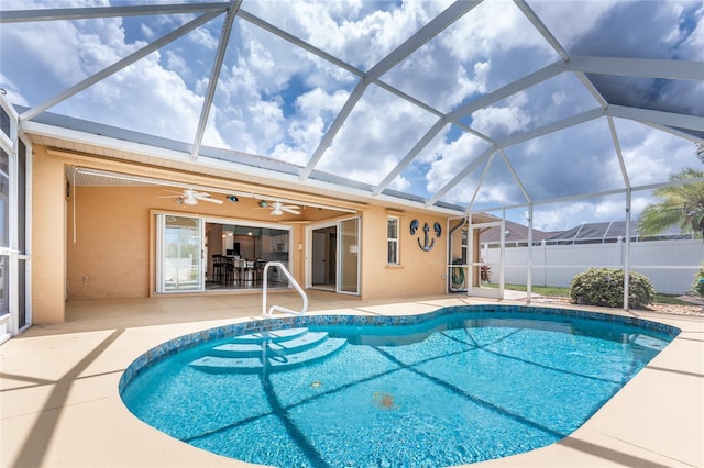 127 Jennifer Dr, Rotonda West, FL 33947 - view of swimming pool with a patio, a ceiling fan, and glass enclosure