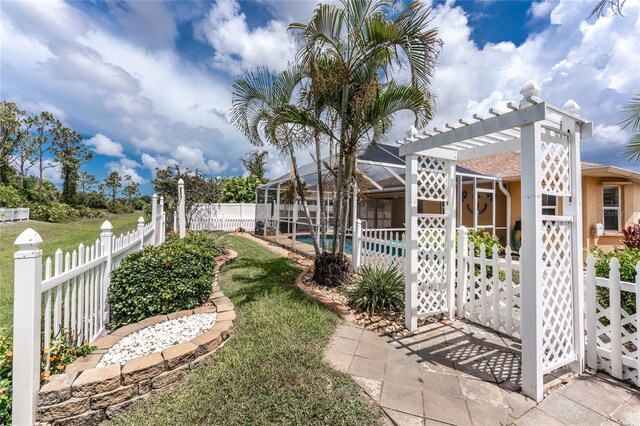 127 Jennifer Dr, Rotonda West, FL 33947 - fenced backyard featuring a lanai