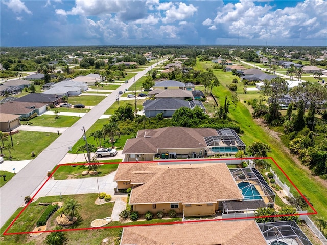 127 Jennifer Dr, Rotonda West, FL 33947 - aerial perspective of suburban area featuring property parcel outlined