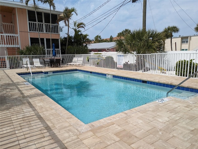 2373 N Beach Rd Unit 1C, Englewood, FL 34223 - community pool with a patio and outdoor dining area
